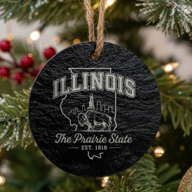 Round slate Christmas ornament laser engraved with an Illinois design of the Chicago skyline and a bison