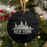 New York, New York skyline engraved on a round slate Christmas ornament