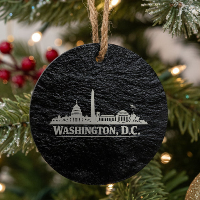Washington, DC skyline engraved on a round slate Christmas ornament
