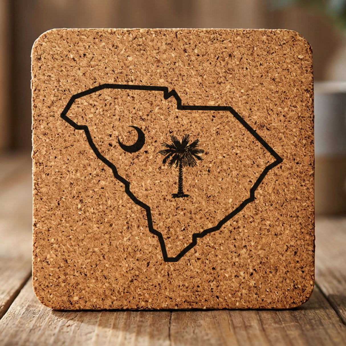 South Carolina square cork coaster engraved with the state outline, palmetto tree and crescent moon