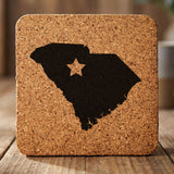 South Carolina square cork coaster engraved with the state shape and a star