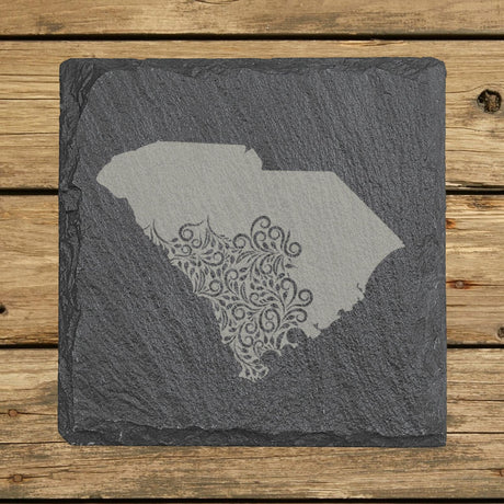 South Carolina square slate coaster engraved with the state shape in ornate floral scrollwork