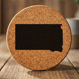 South Dakota round cork coaster with the full state shape engraved
