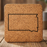 South Dakota square cork coaster engraved with a clean state outline