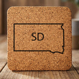 South Dakota square cork coaster engraved with the state outline and SD initials
