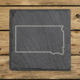 South Dakota square slate coaster engraved with a clean state outline