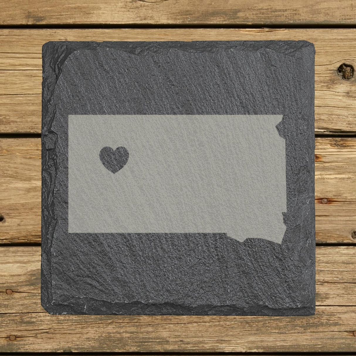 South Dakota square slate coaster engraved with the state shape and a heart