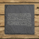 South Dakota square slate coaster engraved with a word cloud of repeating South Dakota text