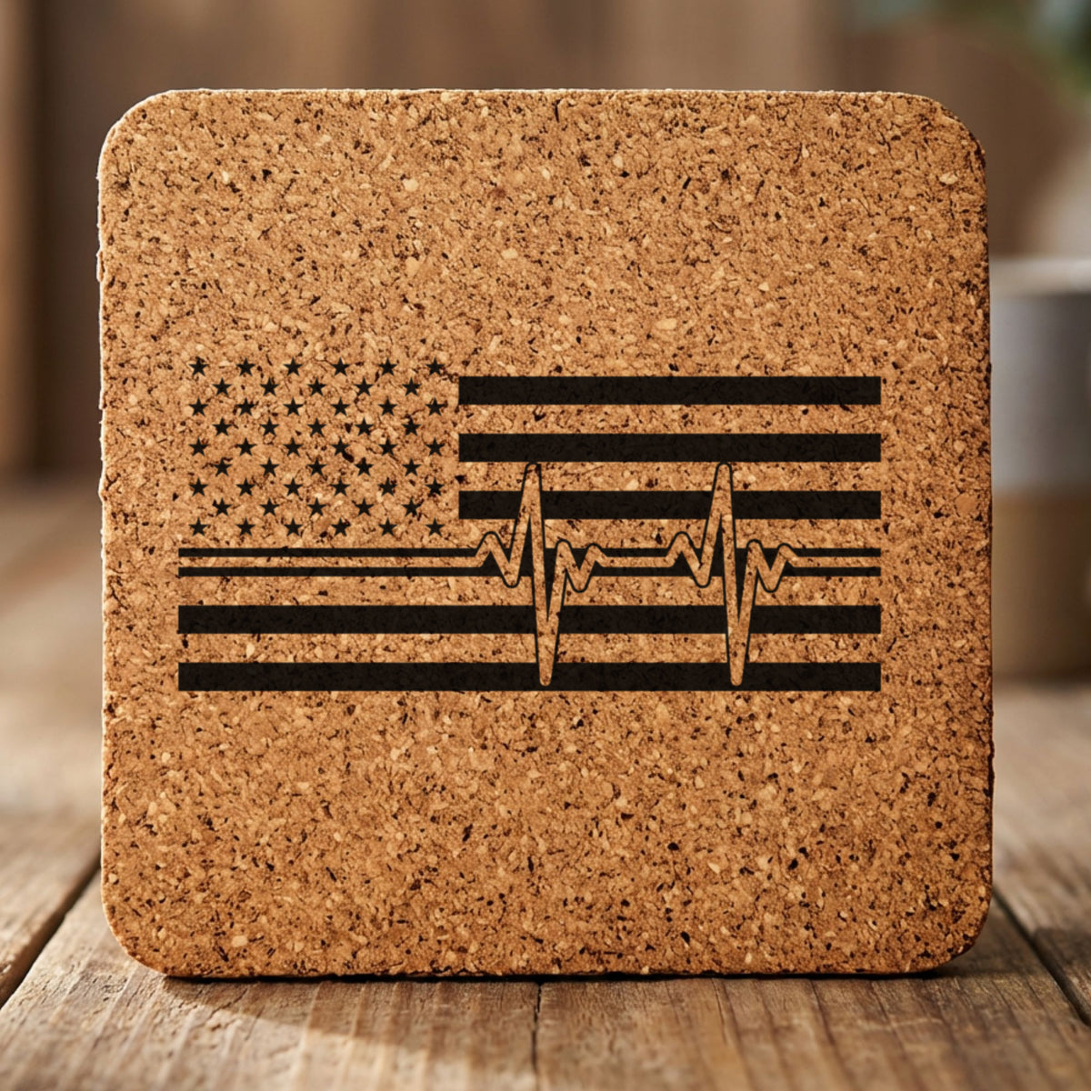 Square cork coaster laser engraved with an American flag, heartbeat design