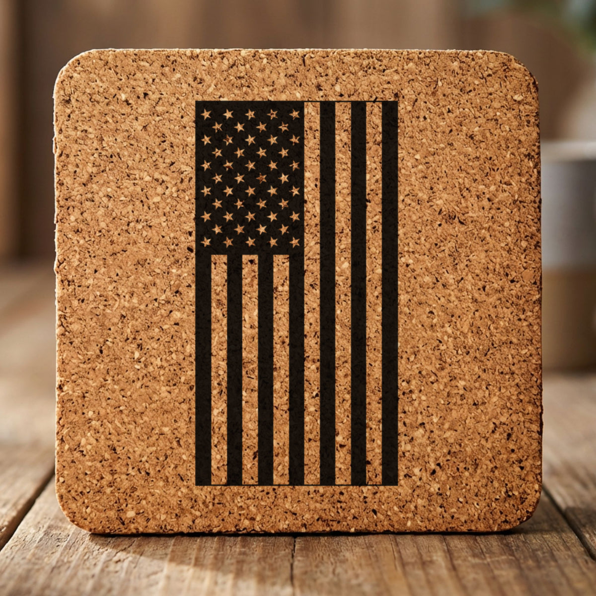 Square cork coaster laser engraved with an American flag, vertical design