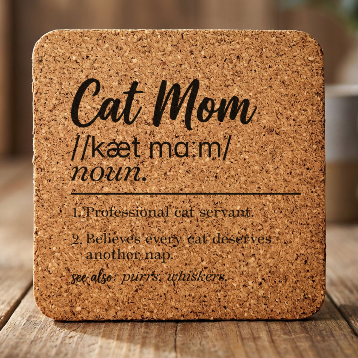 Square cork coaster laser engraved with the Cat Mom definition
