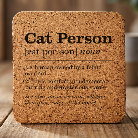 Square cork coaster laser engraved with the Cat Person definition