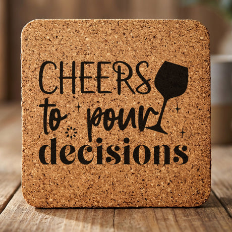 Square cork coaster laser engraved with "Cheers to Pour Decisions"