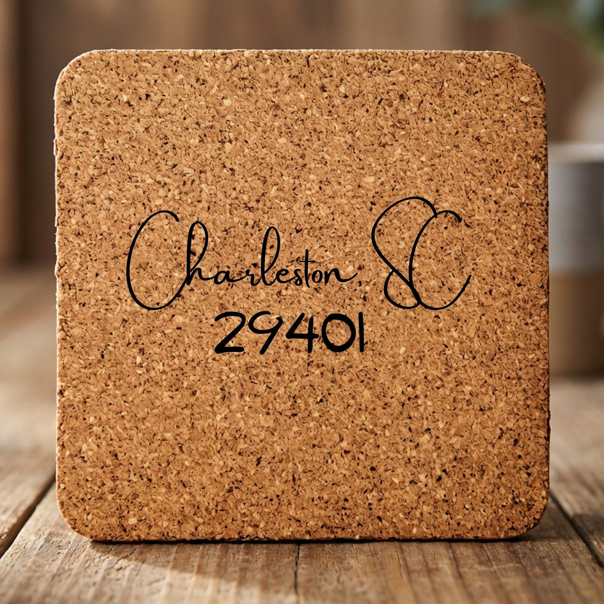 Square cork coaster laser engraved with a custom zip code design