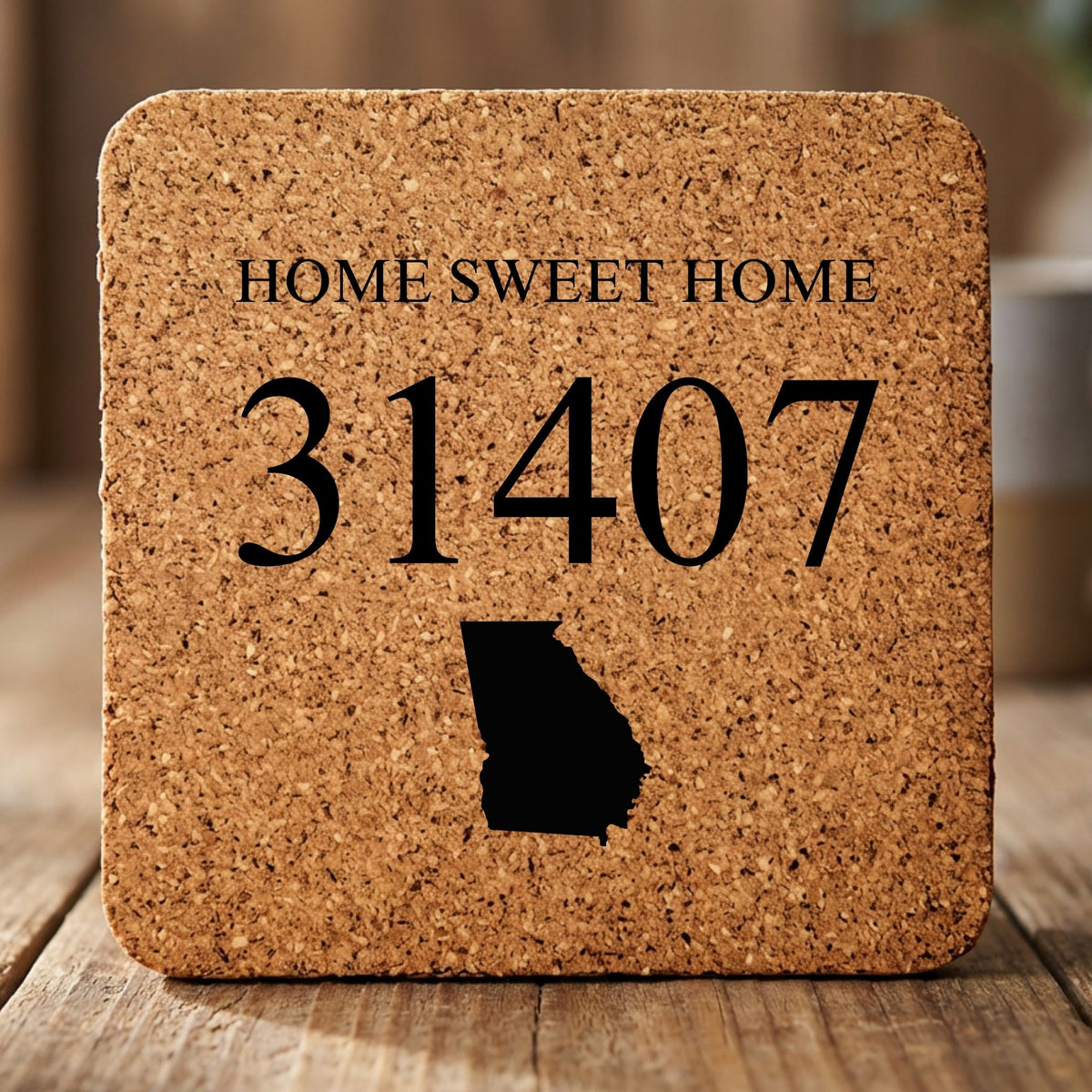 Square cork coaster laser engraved with a custom zip code design