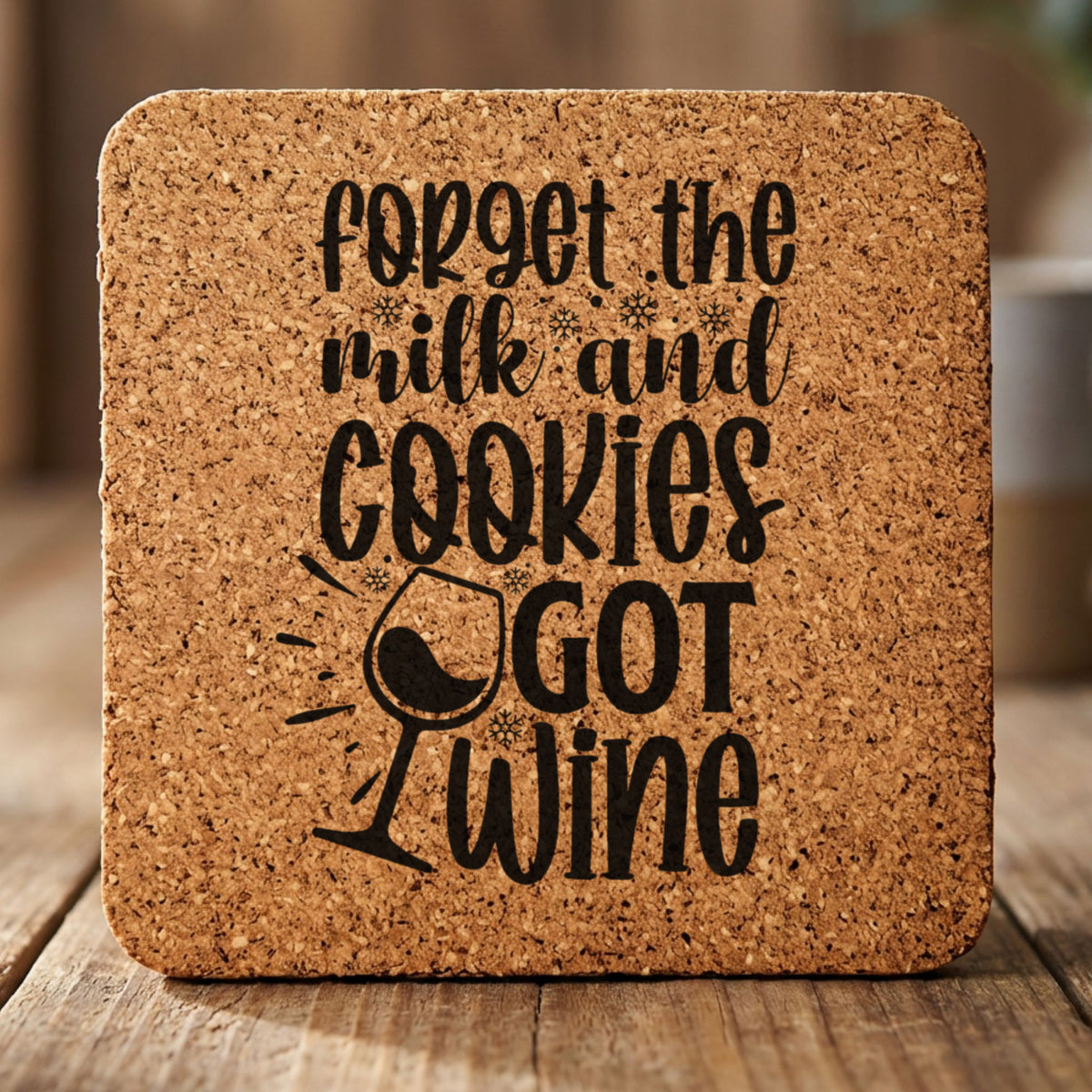 Square cork coaster laser engraved with "Forget the Milk and Cookies, I've Got Wine"