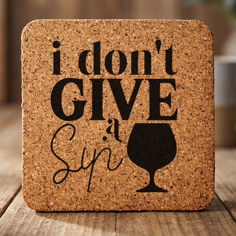 Square cork coaster laser engraved with "I Don't Give a Sip"