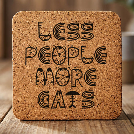 Square cork coaster laser engraved with "Less People, More Cats", retro design
