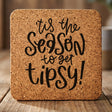 Square cork coaster laser engraved with "'Tis the Season to Get Tipsy"
