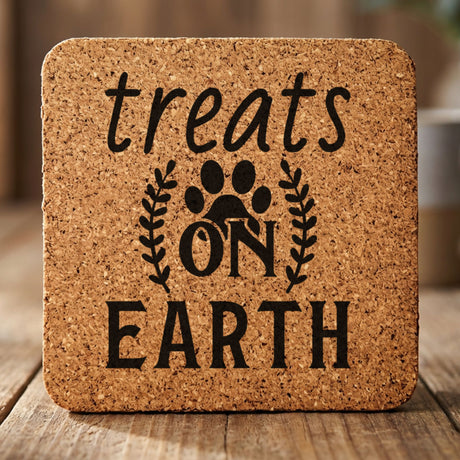 Square cork coaster laser engraved with "Treats on Earth"