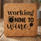 Square cork coaster laser engraved with "Working Nine to Wine"