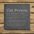 Square slate coaster laser engraved with the Cat Person definition