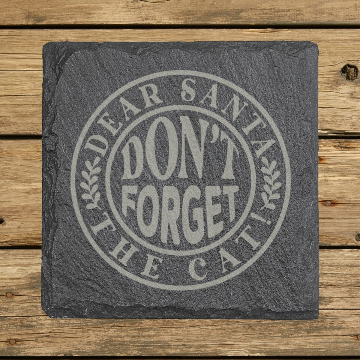 Square slate coaster laser engraved with "Dear Santa, Don't Forget the Cat", round badge design