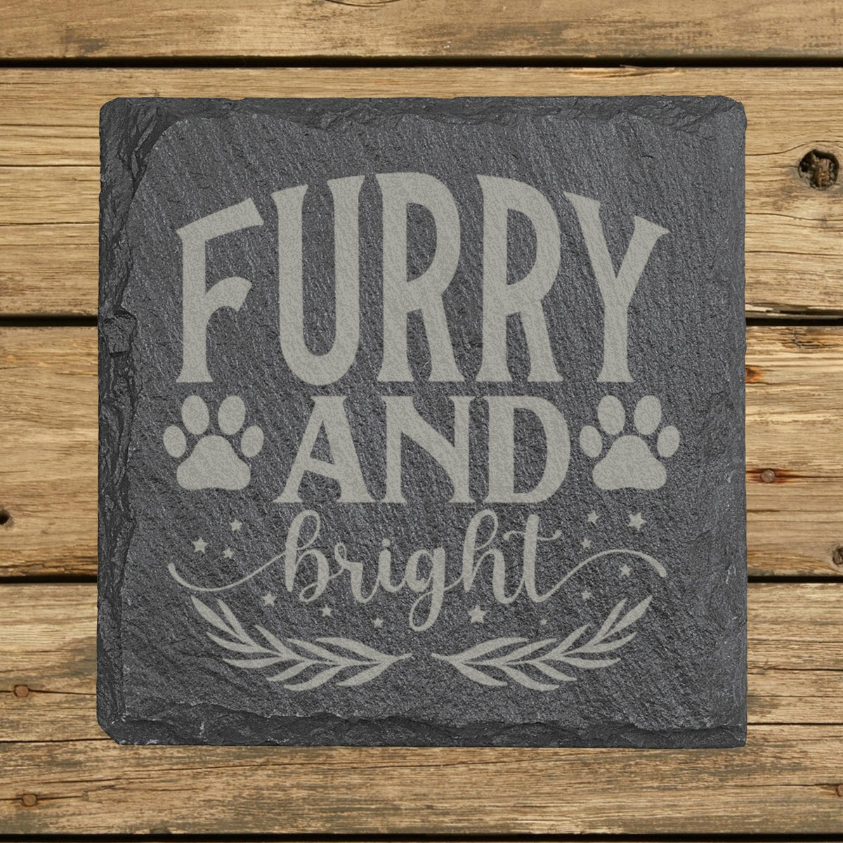 Square slate coaster laser engraved with "Furry and Bright", paws design