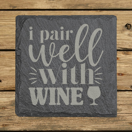 Square slate coaster laser engraved with "I Pair Well with Wine"