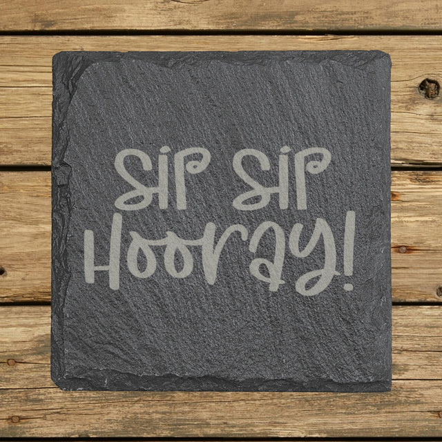 Square slate coaster laser engraved with "Sip Sip Hooray"