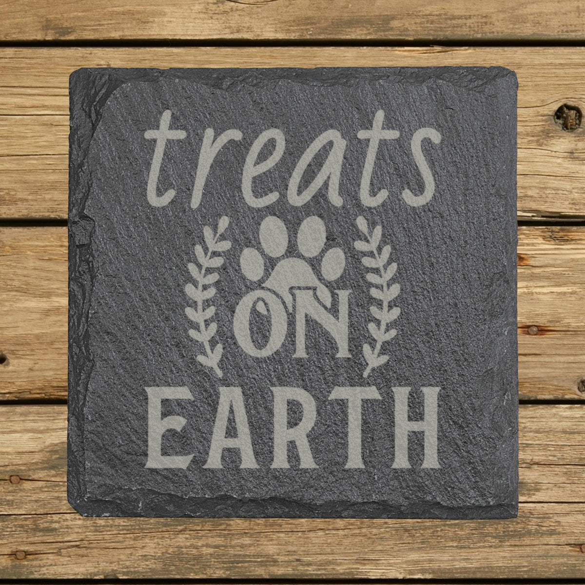 Square slate coaster laser engraved with "Treats on Earth"