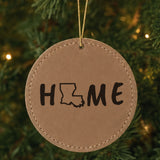 Brown leatherette round Christmas ornament laser engraved with the Louisiana HOME Outline design, hanging on a tree