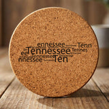 Tennessee round cork coaster engraved with a word cloud of repeating Tennessee text