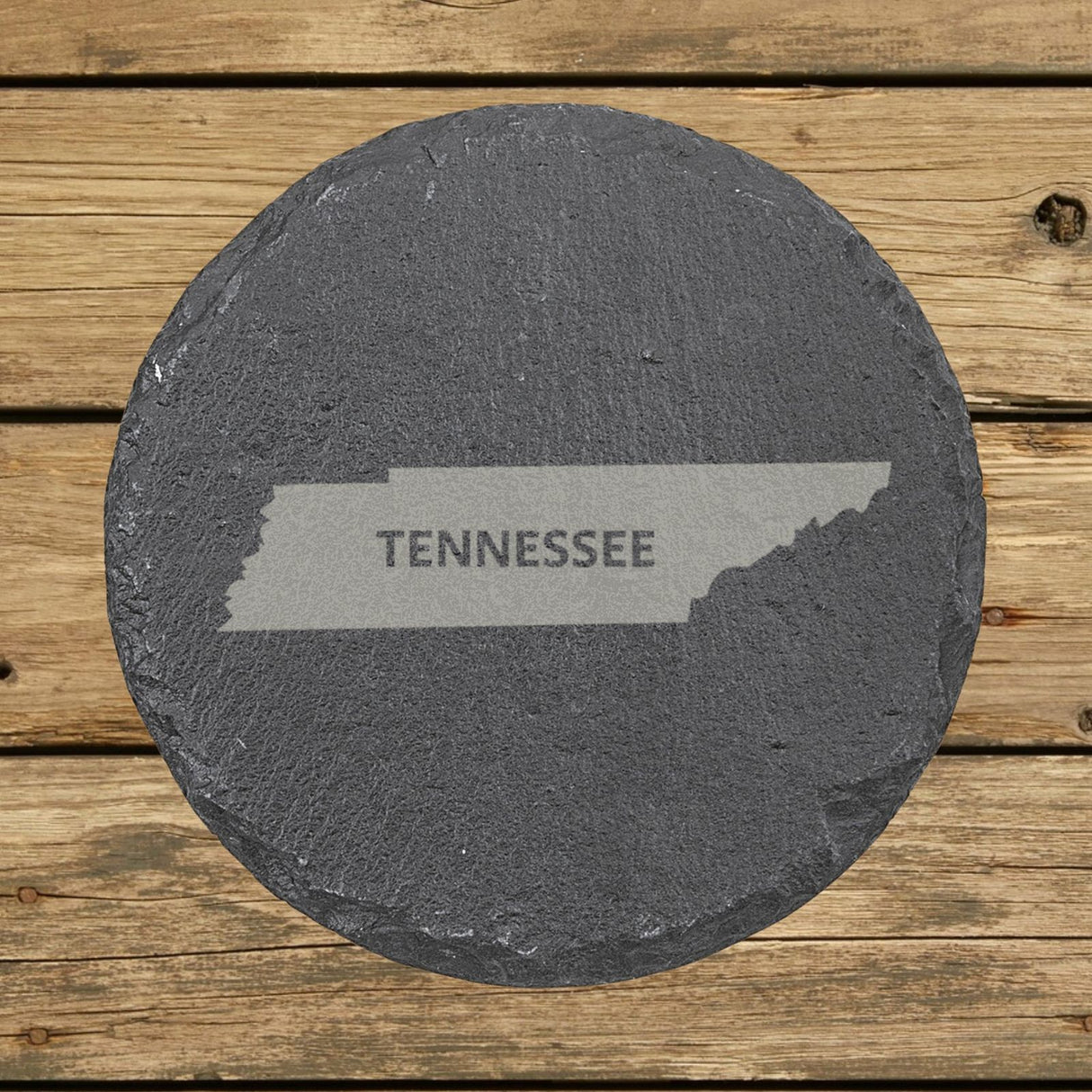 Tennessee round slate coaster engraved with the state shape and TENNESSEE in bold lettering