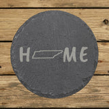 Tennessee round slate coaster engraved with HOME using the state outline as the letter O