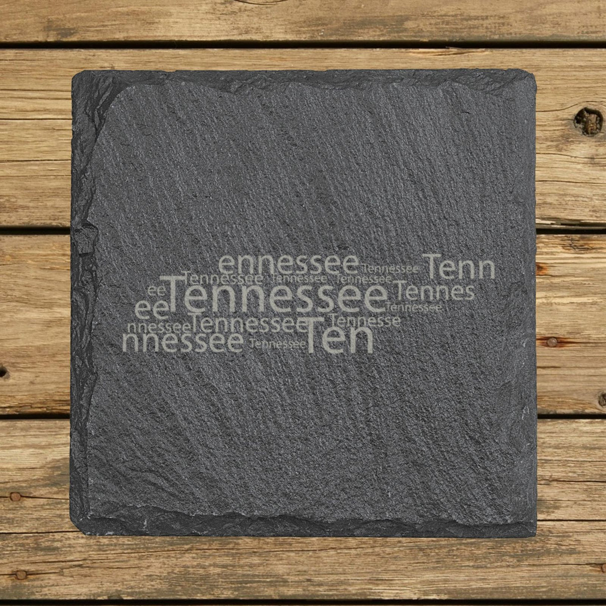 Tennessee square slate coaster engraved with a word cloud of repeating Tennessee text