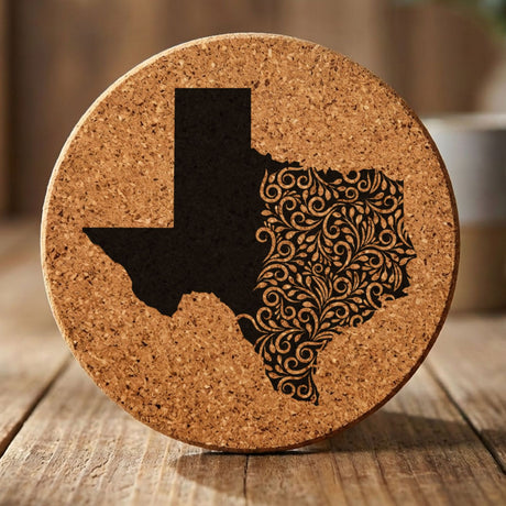 Texas round cork coaster engraved with the state shape in ornate floral scrollwork