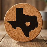Texas round cork coaster engraved with the state shape and a heart