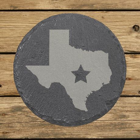 Texas round slate coaster engraved with the state shape and a star