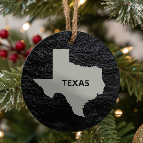 Texas round slate Christmas ornament engraved with the state shape and TEXAS in bold lettering