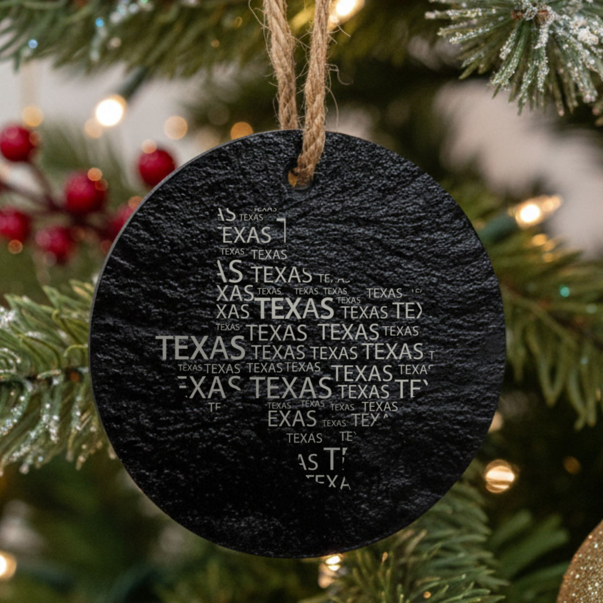 Texas round slate Christmas ornament engraved with a word cloud of repeating Texas text