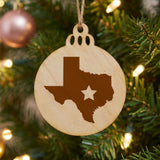 Texas round wood Christmas ornament engraved with the state shape and a star