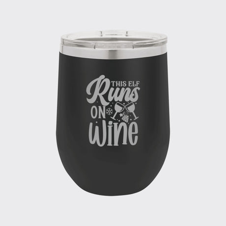 Black 12 oz stemless wine tumbler laser engraved with "This Elf Runs on Wine"