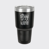 Black 30 oz tumbler laser engraved with "This Elf Runs on Wine"