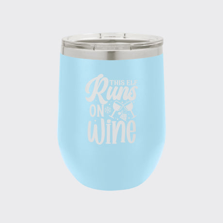 Light Blue 12 oz stemless wine tumbler laser engraved with "This Elf Runs on Wine"