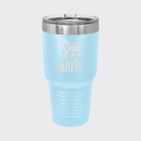 Light Blue 30 oz tumbler laser engraved with "This Elf Runs on Wine"