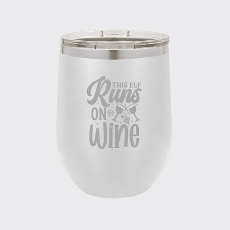 White 12 oz stemless wine tumbler laser engraved with "This Elf Runs on Wine"