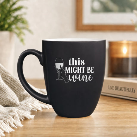 16 oz black ceramic coffee mug with "This Might Be Wine"