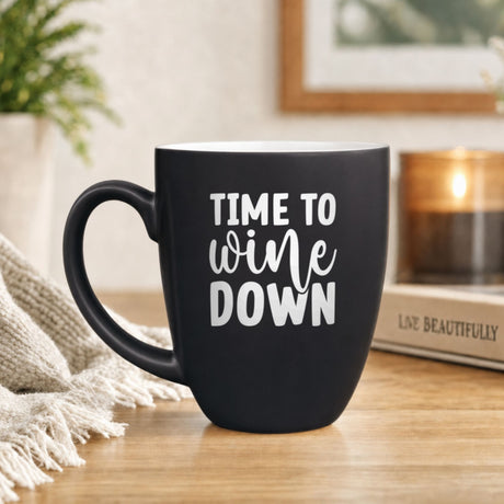 16 oz black ceramic coffee mug with "Time to Wine Down"