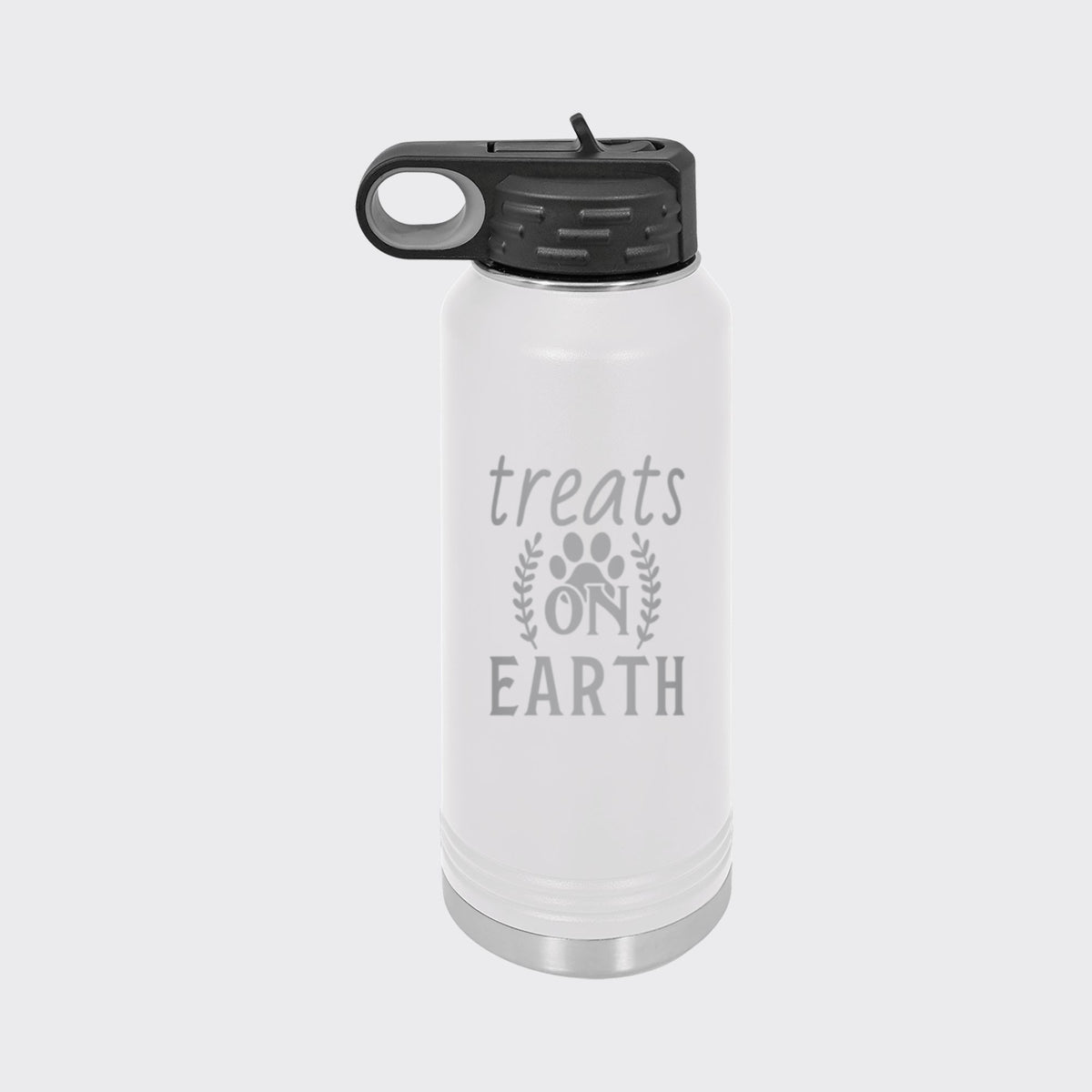White 32 oz insulated water bottle laser engraved with "Treats on Earth"